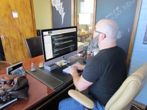 Designer Builds Custom Website Designer Builds Custom Website